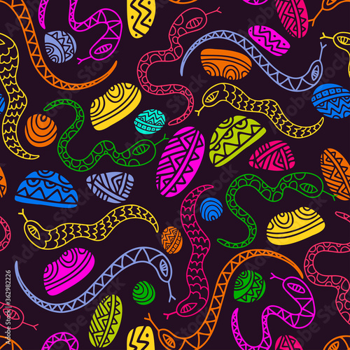 Seamless vector pattern with decorative colorful lined gummy snakes in bright colors on dark background. The design is perfect for backgrounds, packages, wrapping paper, wallpaper, textiles, sheets