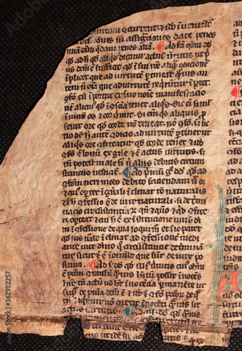 A manuscript on vellum of St Thomas Aquinas written in the twelfth or thirteenth century with rubricated red initials. 