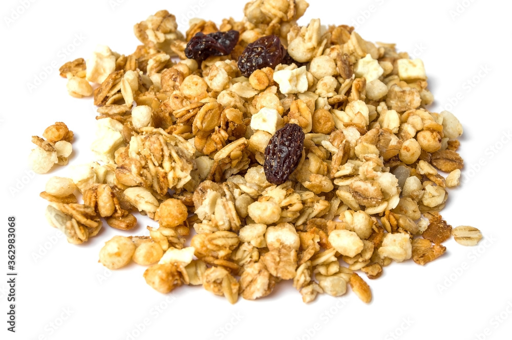 Granola on a white background, selective focus. Granola on a white background, selective focus.