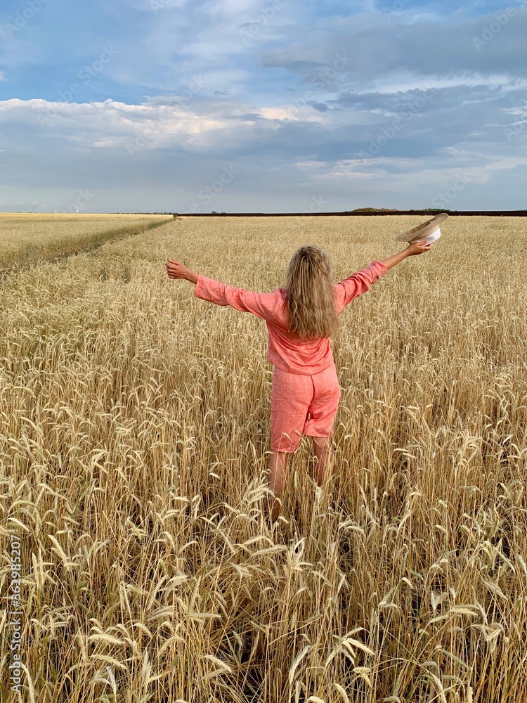 Girl with wheat hair in a wheat field Girl with wheat hair in a wheat field