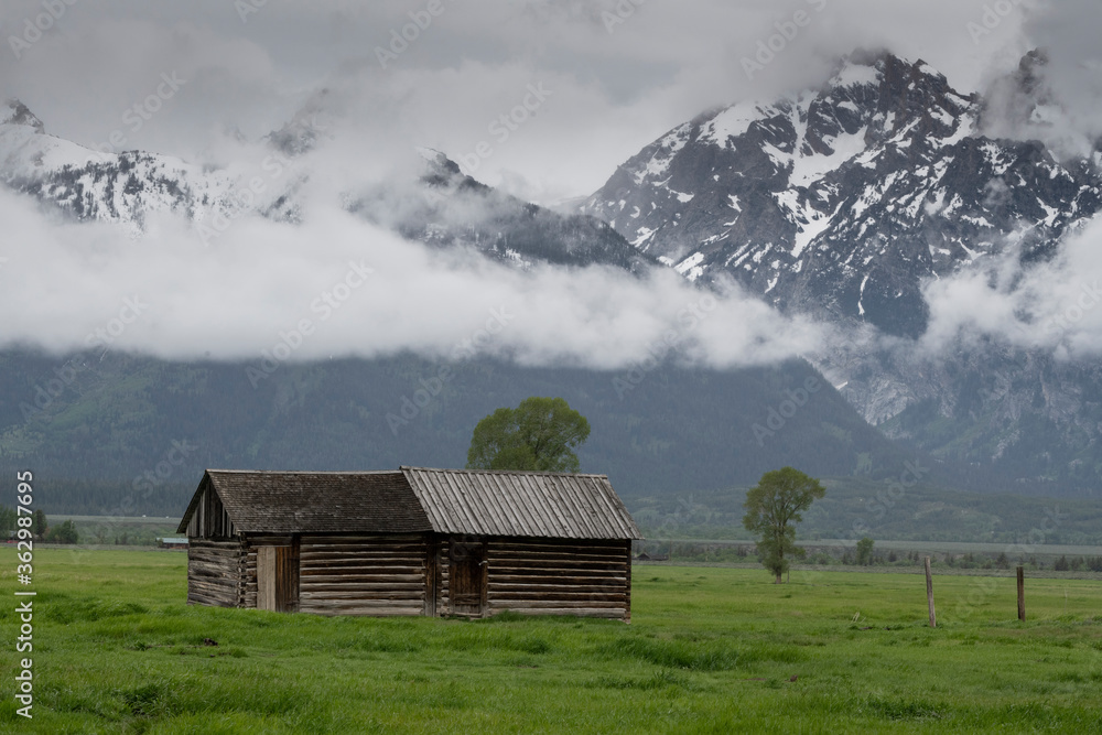 Barn landscape with Mountains