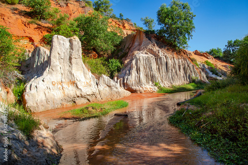 Fairy Stream Canyon or Red River Canyon on the shores of colored sandstone in Mui Ne, Vietnam photo