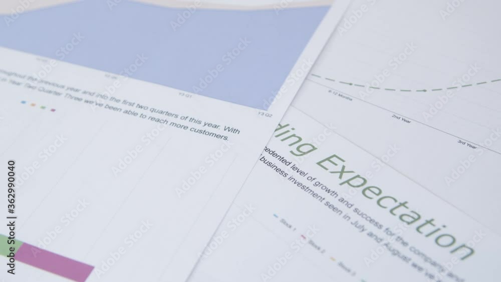 Tracking Out Business Reports and Analysis on Desk Tracking Out Business Reports and Analysis on Desk