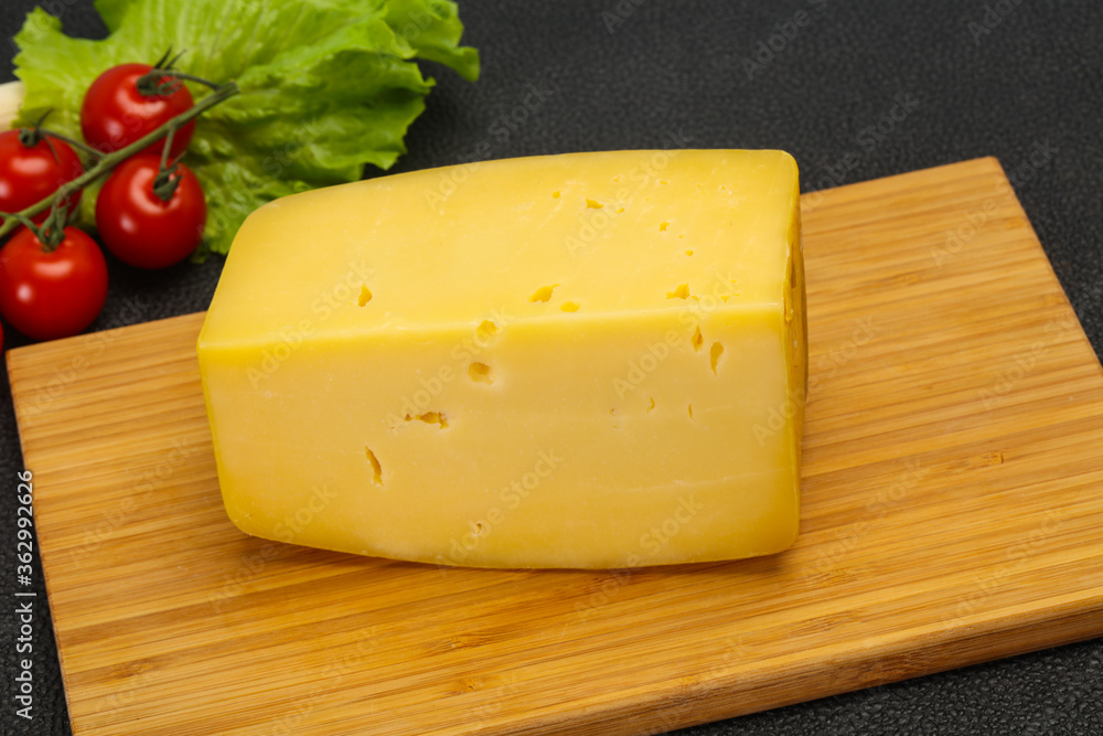 Hard yellow tasty cheese brick Hard yellow tasty cheese brick