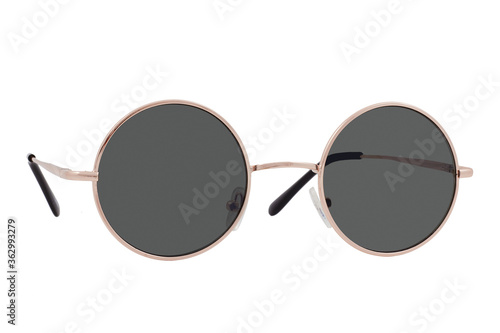 Obraz na płótnie Round sunglasses with a gold frame and black lenses isolated on white background. w salonie
