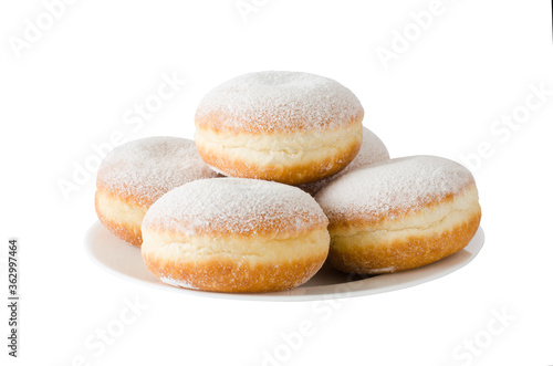 Traditional sweet donuts with powdered sugar and jam. Fat Thursday or Hanukkah celebration.