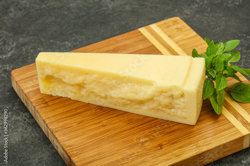 Hard parmesan cheese served basil