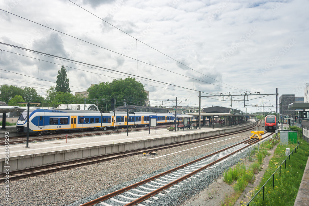 Trains arrive and depart at the central station of Gouda, Holland Trains arrive and depart at the central station of Gouda, Holland