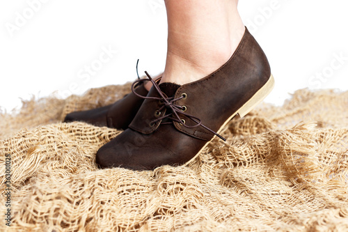 Ladies brown leather vintage shoes isolated close-up photo