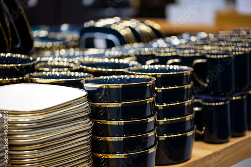 Luxury ceramic plates on a table is the background selective focus and shallow depth of field