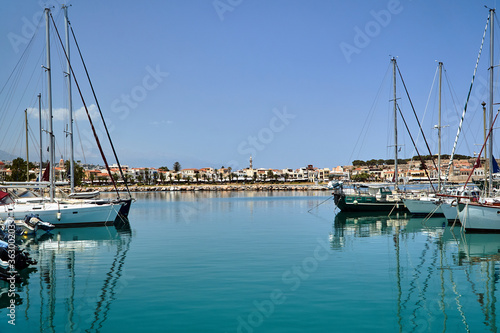 sailboats and yachts in the port of Rethymnon © GKor