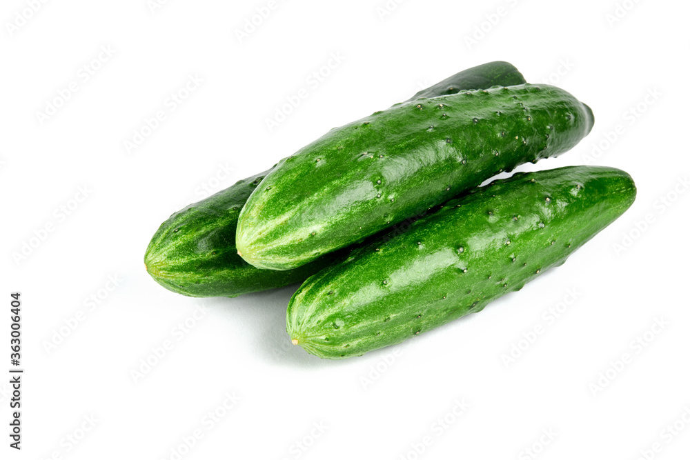group of a fresh tasty cucumbers isolated on white background. group of a fresh tasty cucumbers isolated on white background.