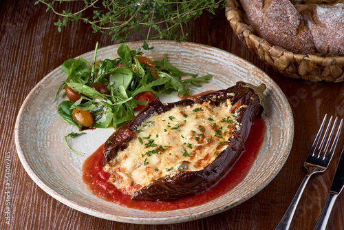 Baked eggplant, meat stews, tomatoes, cheese, delicious Italian dish