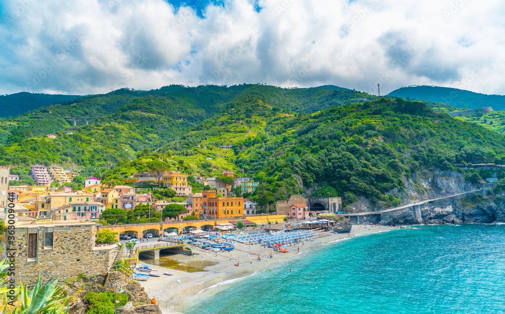 Cinque Terre, Italy - july 1st 2020 - Overview of the village with an empty beach due to Corona in Monterosso al Mare, one of the towns known as Cinque Terre