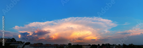 Panorama of huge storm clouds over the city