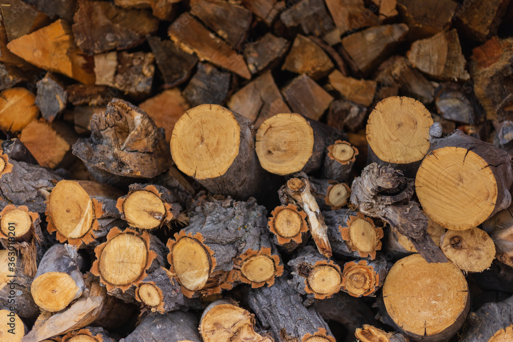 Firewood logs cut and ready for winter at a rural Colorado ranch home near Denver Firewood logs cut and ready for winter at a rural Colorado ranch home near Denver