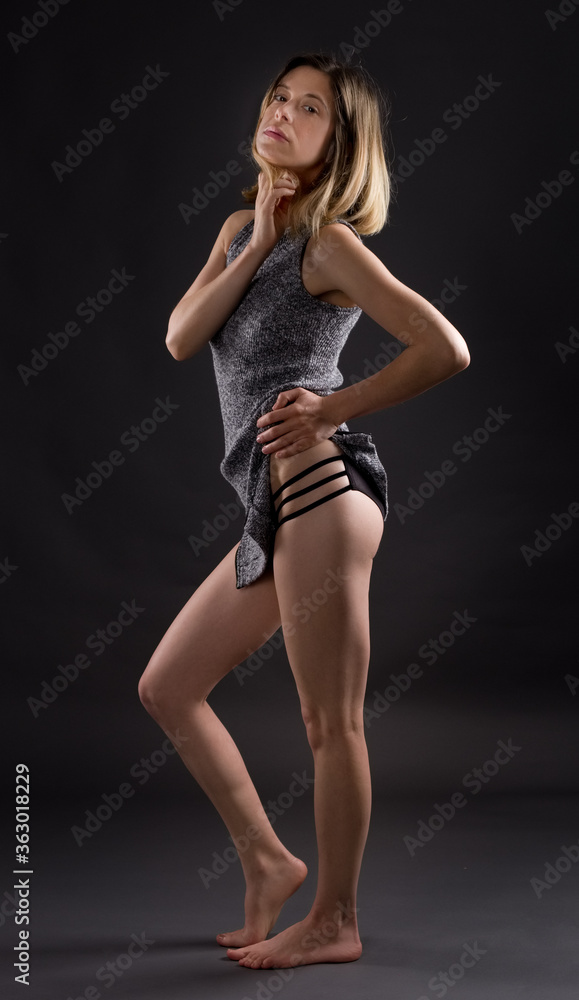 Woman in Dress With Strappy Underwear Beneath