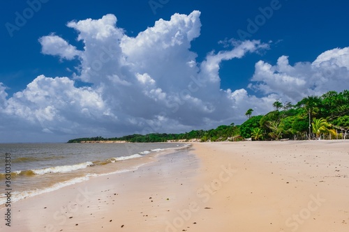 Breathtaking shot of the seascape with a sandy beach under a cloudy sky in Brazil