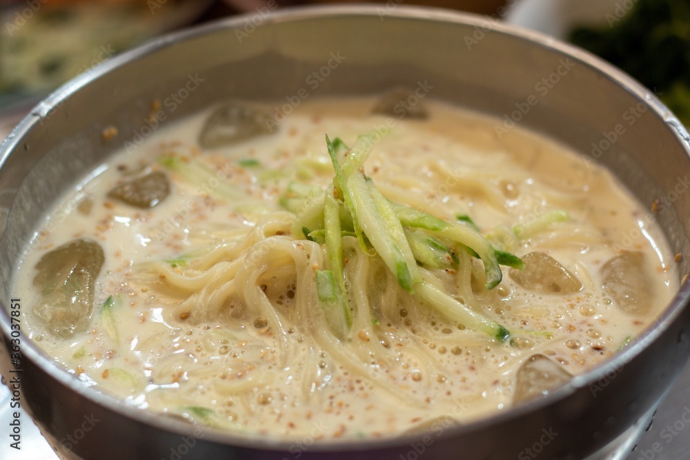 Selective focus shot of Korean noodles soup