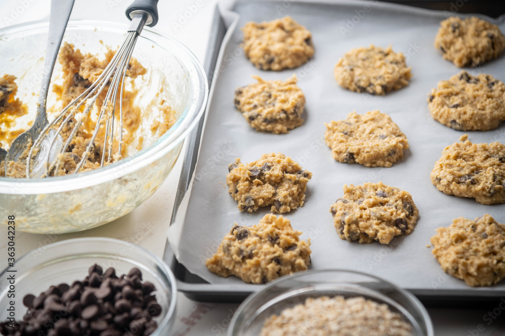 chocolate chip oatmeal cookie dough on iron pan chocolate chip oatmeal cookie dough on iron pan