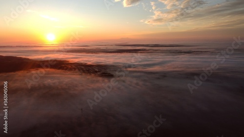 Sunrise over the fog Drone shot