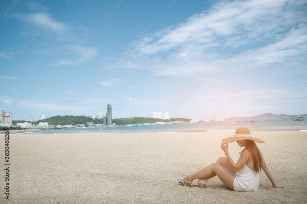 young woman sitting on beach, travel on holidays, girl enjoying at summer, relax on beach, happy time, vocation
young woman sitting on beach, travel on holidays, girl enjoying at summer, relax on beach, happy time, vocation