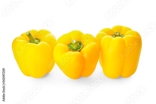 Yellow bell peppers on white background
