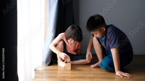 Wallpaper Mural kid playing miniature house model
 Torontodigital.ca