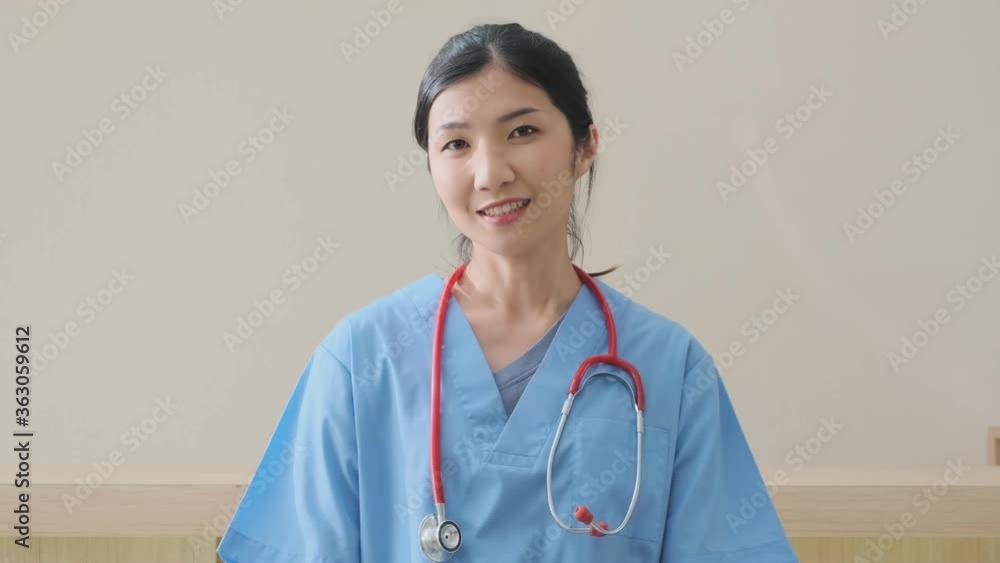 portrait of smart asian female doctor explain and suggesting a way to takecare yourself with happiness smiling cheerful Caring for patients at the hospital portrait of smart asian female doctor explain and suggesting a way to takecare yourself with happiness smiling cheerful Caring for patients at the hospital