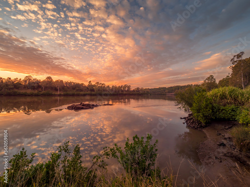 Beautiful Riverside Sunrise with Reflections