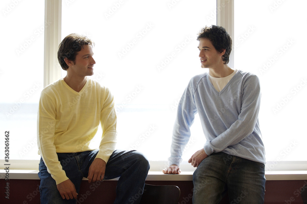 Two men facing each other Two men facing each other