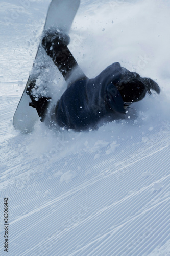 Fototapeta Naklejka Na Ścianę i Meble -  Snowboarder fall on winter snow