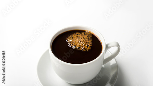 black coffee in a coffee cup top view isolated on white background. breakfast