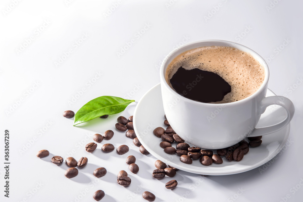 Coffee cup and coffee beans on white background Coffee cup and coffee beans on white background