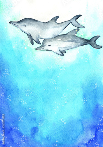 Dolphin swimming under the sea watercolor hand painting background.