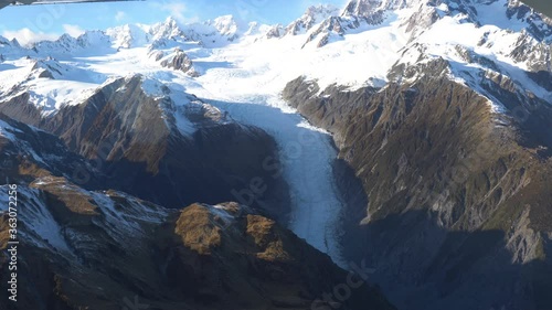 Scenic flight looking out to an aerial view of Franz Josef glacier in New Zealand