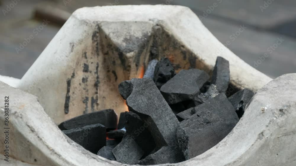 Fire burning charcoal in asian stove , for bbq Fire burning charcoal in asian stove , for bbq
