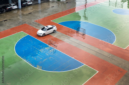 Car crossing over sport field photo