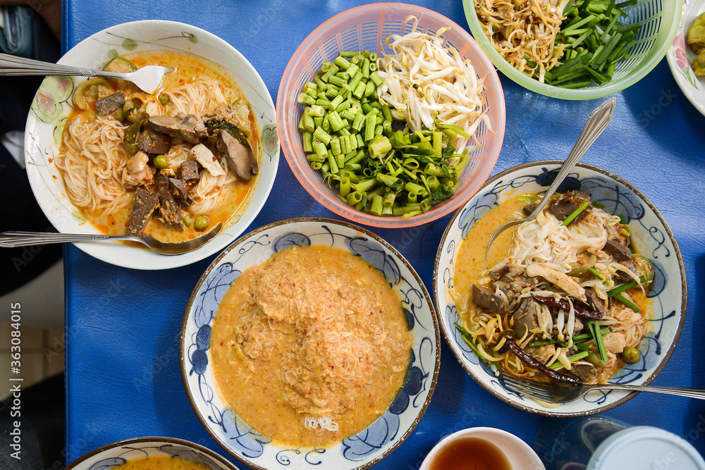 Kanom jean - rice noodle eat with thai curry and boiled vegetable Kanom jean - rice noodle eat with thai curry and boiled vegetable