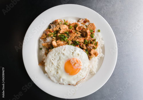 fried curry chicken with rice and fried egg