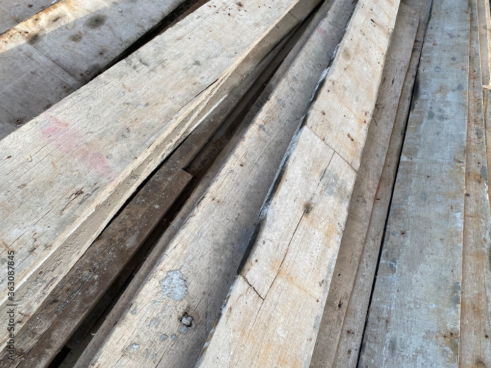 pile of big brown wood plank