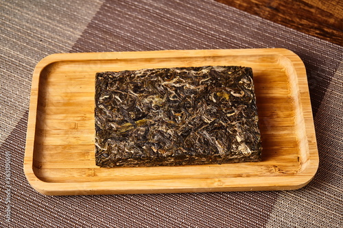 Pu-erh tea on a wooden tray