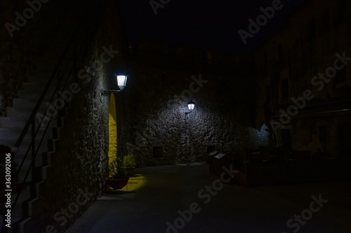 Night scene of medieval castle on the beach in girona, 2018 photo