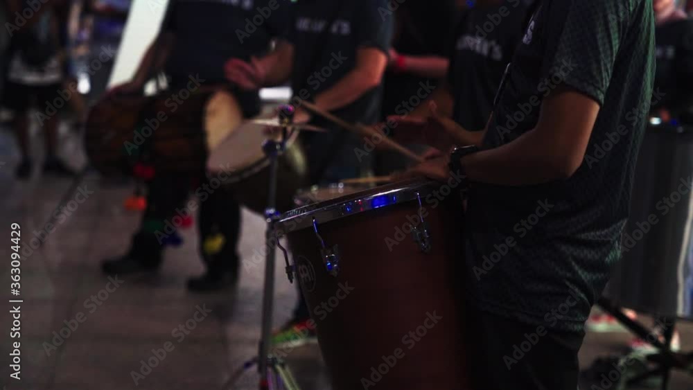 Street performers of Kuala Lumpur playing traditional instruments and music in Malaysia. Street performers of Kuala Lumpur playing traditional instruments and music in Malaysia.