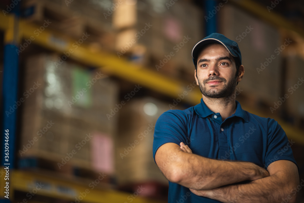 Portraits of male warehouse personnel staff wearing blue uniforms Currently working in storage and transportation internationally. Portraits of male warehouse personnel staff wearing blue uniforms Currently working in storage and transportation internationally.