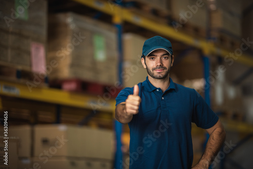 Portraits of male warehouse...