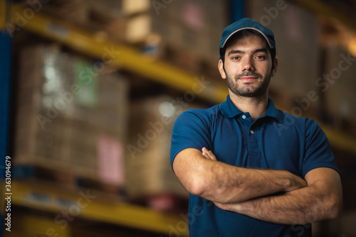 Portraits of male warehouse personnel staff wearing blue uniforms Currently working in storage and transportation internationally.