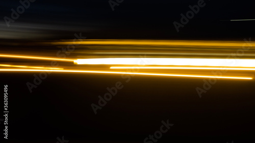 Light speed trails on dark background. Abstract technology concept