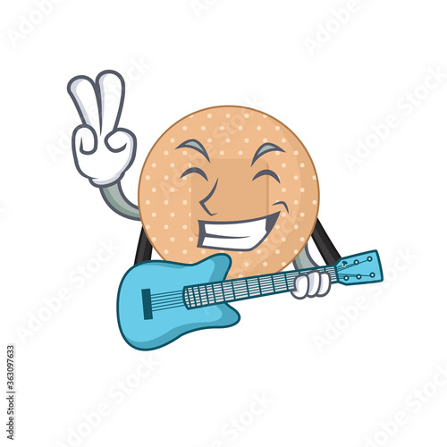 Rounded bandage musician cartoon design playing a guitar