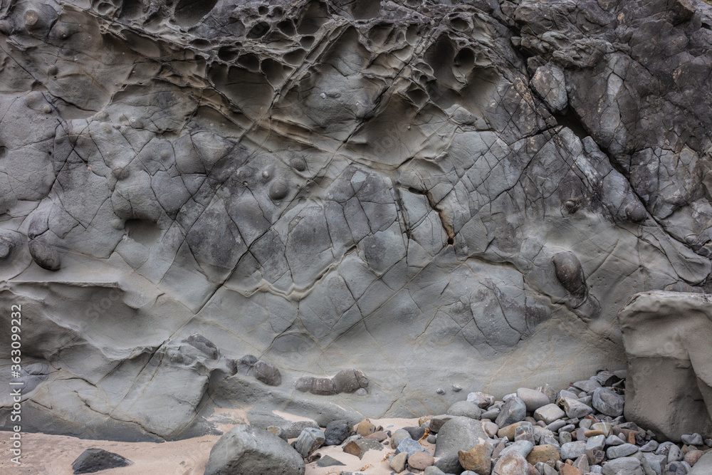 close up of a rock formation at the beach